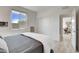 Bedroom with large window and slider closet at 6830 Compass St, North Las Vegas, NV 89084