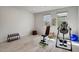 Bright exercise room with weights, inversion table, bench, and workout ball at 6830 Compass St, North Las Vegas, NV 89084