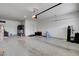Spacious two car garage with painted floor and door to interior of home at 6830 Compass St, North Las Vegas, NV 89084