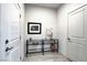 Inviting hallway featuring a console table with glass top and stylish decor at 6830 Compass St, North Las Vegas, NV 89084