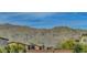 Scenic mountain view from a neighborhood home with great landscaping at 6830 Compass St, North Las Vegas, NV 89084