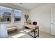 Bright office space with natural light and contemporary desk with bench at 6830 Compass St, North Las Vegas, NV 89084