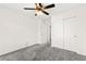 Comfortable bedroom featuring plush gray carpeting and a spacious closet at 7189 Ashcroft St, North Las Vegas, NV 89084