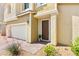 Charming two-story home with a well-maintained front yard and attached garage at 7189 Ashcroft St, North Las Vegas, NV 89084