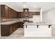 Spacious kitchen with stainless steel appliances, granite counters, and large center island at 7189 Ashcroft St, North Las Vegas, NV 89084