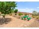 Scenic park area featuring a picnic table amid mature trees and desert landscaping at 7189 Ashcroft St, North Las Vegas, NV 89084