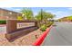 Tierra Santa community sign with lush landscaping and paved entrance at 7189 Ashcroft St, North Las Vegas, NV 89084