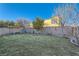 A view of a nicely landscaped backyard with a block wall for privacy at 7337 Savannah Falls St, Las Vegas, NV 89131