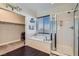 Elegant bathroom with soaking tub, separate shower, and walk-in closet at 7337 Savannah Falls St, Las Vegas, NV 89131