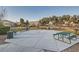 A view of the community area with picnic tables and BBQ grills for outdoor entertaining at 7337 Savannah Falls St, Las Vegas, NV 89131