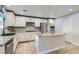 Well-lit kitchen with stainless steel appliances, granite countertops, and a convenient island at 7337 Savannah Falls St, Las Vegas, NV 89131