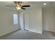 Bedroom with modern ceiling fan, neutral paint, and carpet at 7412 Bewitching Ct, Las Vegas, NV 89149