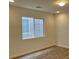 Bright bedroom with recessed lighting, fresh paint, and new laminate flooring at 7412 Bewitching Ct, Las Vegas, NV 89149