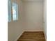 A bright bedroom with natural lighting and wood floors at 7412 Bewitching Ct, Las Vegas, NV 89149