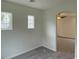 Cozy bedroom featuring multiple windows and plush carpet at 7412 Bewitching Ct, Las Vegas, NV 89149
