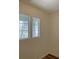 Well-lit bedroom with light-colored walls and window at 7412 Bewitching Ct, Las Vegas, NV 89149