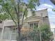 Charming home featuring a cozy balcony, covered porch and well-maintained landscaping at 7412 Bewitching Ct, Las Vegas, NV 89149