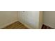 Hallway featuring neutral paint and wood style flooring at 7412 Bewitching Ct, Las Vegas, NV 89149