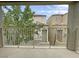 View from patio shows nearby houses and mature trees at 7412 Bewitching Ct, Las Vegas, NV 89149