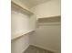 Walk-in closet features carpet and wooden closet rods at 7412 Bewitching Ct, Las Vegas, NV 89149