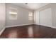 Bright bedroom with dual windows and a sliding door closet with ample space at 7736 Villa Andrade Ave, Las Vegas, NV 89131