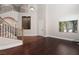Elegant living area boasting hardwood floors, staircase access, and natural light at 7736 Villa Andrade Ave, Las Vegas, NV 89131