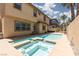 Backyard oasis featuring a pool and jacuzzi, perfect for relaxing or entertaining at 7736 Villa Andrade Ave, Las Vegas, NV 89131