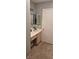 Bathroom showcasing a vanity, mirror, and neutral decor, creating a clean and functional space at 8070 W Russell Rd # 1105, Las Vegas, NV 89113