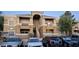 Two-story condo building with well-maintained landscaping and ample parking spaces at 8070 W Russell Rd # 1105, Las Vegas, NV 89113