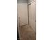 Hallway with standard and closet doors, offering ample storage and access to various rooms at 8070 W Russell Rd # 1105, Las Vegas, NV 89113