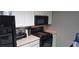 Efficient kitchen with stainless steel sink and modern appliances at 8070 W Russell Rd # 1105, Las Vegas, NV 89113