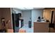 Modern kitchen with white cabinets and black appliances at 8070 W Russell Rd # 1105, Las Vegas, NV 89113