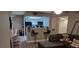 Open-concept living area with breakfast bar seating at 8070 W Russell Rd # 1105, Las Vegas, NV 89113
