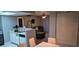 Open-concept space seamlessly connects kitchen, dining, and living areas at 8070 W Russell Rd # 1105, Las Vegas, NV 89113