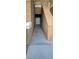 Exterior walkway with a textured wall finish leading to an entryway at 8070 W Russell Rd # 1105, Las Vegas, NV 89113