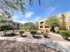 Attractive building exterior with landscaped grounds and inviting walkways in a residential community at 8070 W Russell Rd # 2070, Las Vegas, NV 89113