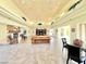 Spacious clubhouse showcasing comfortable seating, a fireplace, and an entertainment area for residents to socialize at 8070 W Russell Rd # 2070, Las Vegas, NV 89113