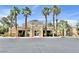 Community clubhouse featuring an attractive facade, well-kept landscaping, and ample parking at 8070 W Russell Rd # 2070, Las Vegas, NV 89113