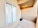 Private entryway with a textured wall and a modern, energy-efficient window for added curb appeal at 8070 W Russell Rd # 2070, Las Vegas, NV 89113