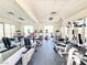 Bright gym features treadmills, stationary bikes, weight machines, and a mirrored wall for convenient exercise at 8070 W Russell Rd # 2070, Las Vegas, NV 89113