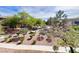 Scenic view of the well-maintained landscaping with lush trees, flowering plants, and inviting walkways at 8070 W Russell Rd # 2070, Las Vegas, NV 89113
