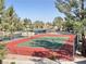 Tennis court and assigned parking visible from a balcony overlooking the community amenities at 8070 W Russell Rd # 2070, Las Vegas, NV 89113