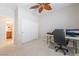 Bedroom with a ceiling fan, closet, and space for computer and desk at 8236 Imperial Lakes St, Las Vegas, NV 89131