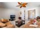 Cozy living room featuring comfortable sofas, and a view of the front entrance at 8236 Imperial Lakes St, Las Vegas, NV 89131