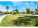 A vibrant green space and walkways in a peaceful residential neighborhood at 8236 Imperial Lakes St, Las Vegas, NV 89131