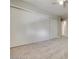 Bedroom features a ceiling fan, plush carpet, and a large closet with sliding doors at 8804 River Pines Ct # 202, Las Vegas, NV 89117