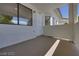 Private front patio featuring secure door, windows, and textured concrete at 8804 River Pines Ct # 202, Las Vegas, NV 89117