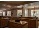 Spacious kitchen features a large island, ample counter space, and an open design concept, ideal for entertaining at 9905 Fox Springs Dr, Las Vegas, NV 89117