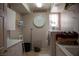 Well-equipped laundry room with washer, dryer, storage cabinets, and ample counter space at 9905 Fox Springs Dr, Las Vegas, NV 89117