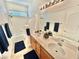 Bathroom features double sinks, stylish fixtures, and a well-lit mirror at 10680 Sapphire Vista Ave, Las Vegas, NV 89144